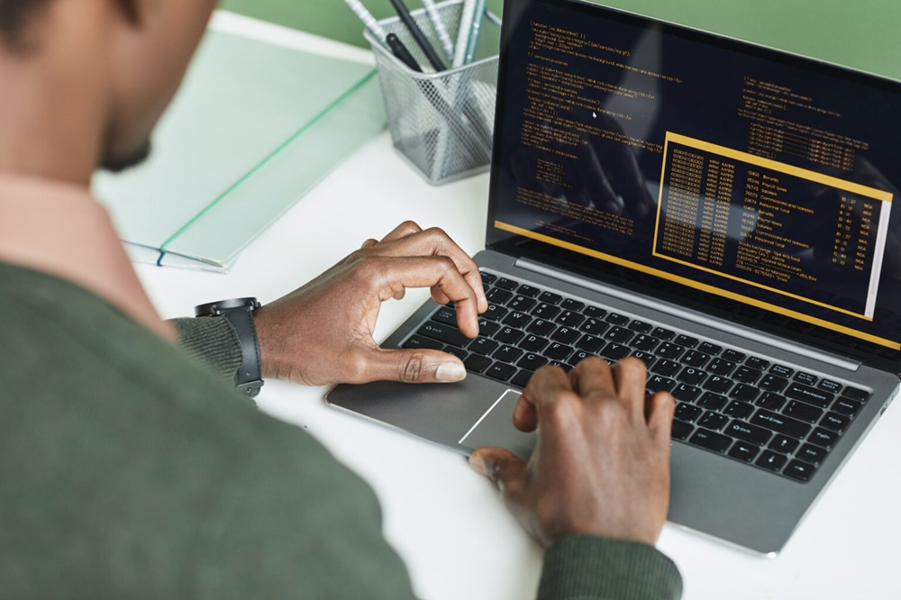 developer-working-on-laptop-1536x1024