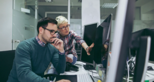 software-developers-at-work-962145656-5b69e9a546e0fb0050da5466-scaled